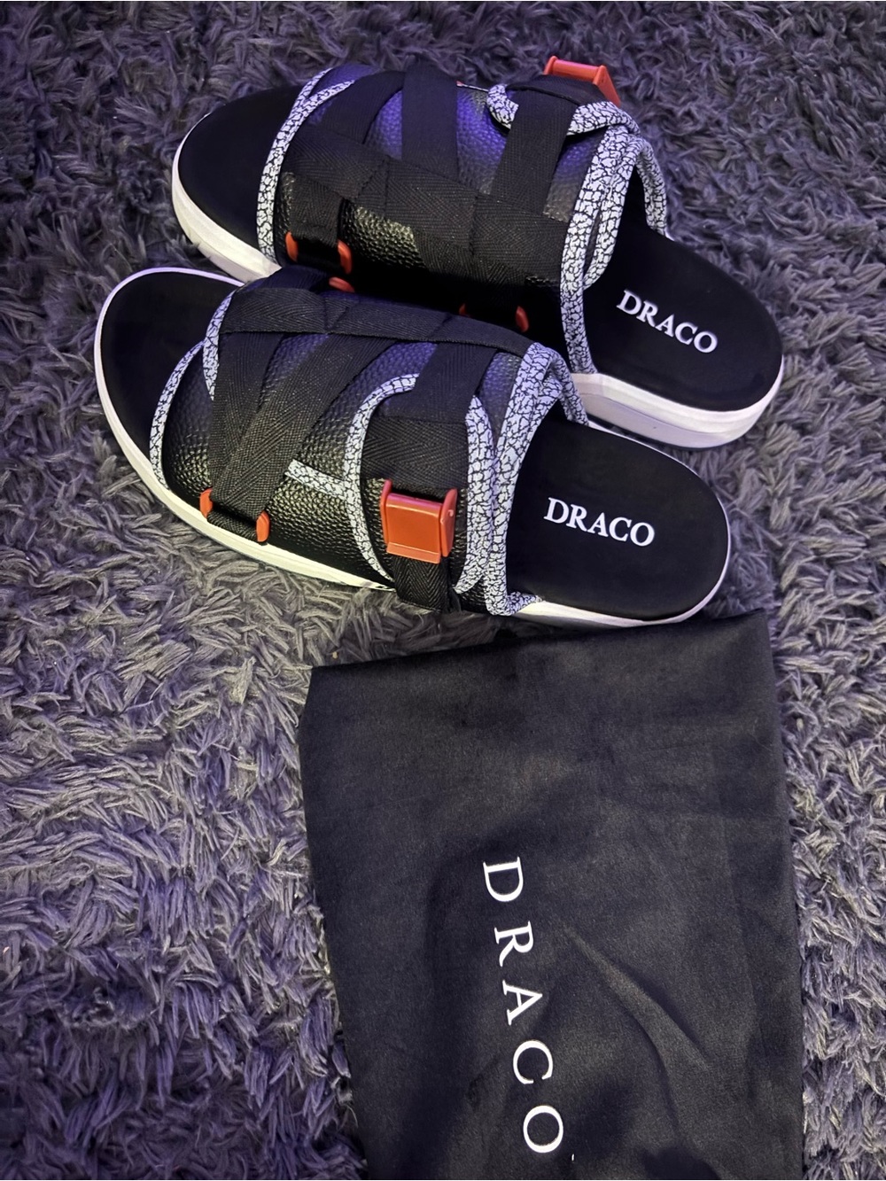 Draco Men’s Black Strap Slide Sandals with White Trim and Orange Accents